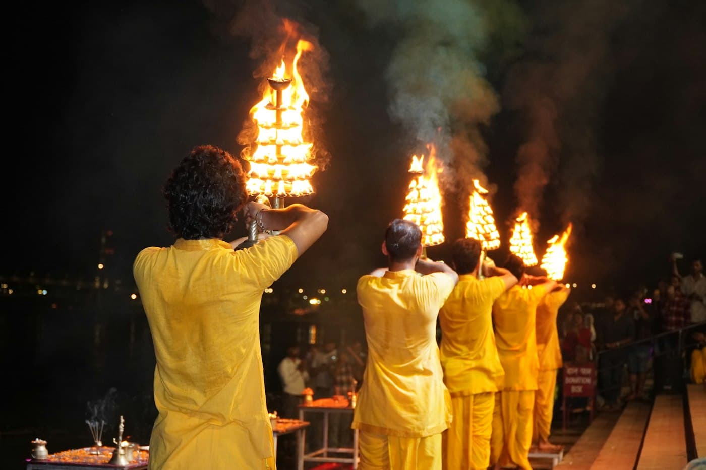Priests in saffron attire gathered for evening ritual