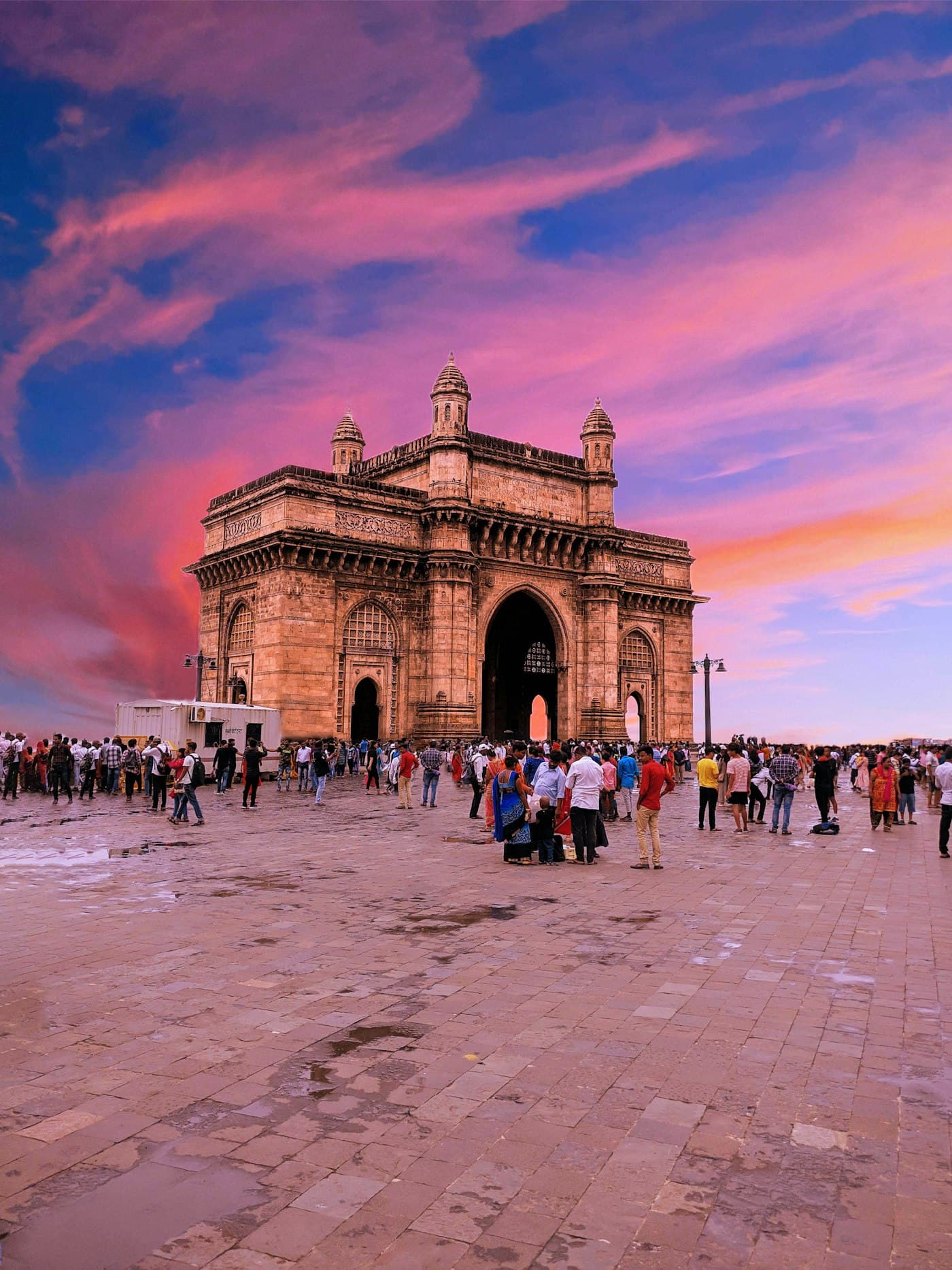 Atmospheric view of illuminated Indian city streets at dusk